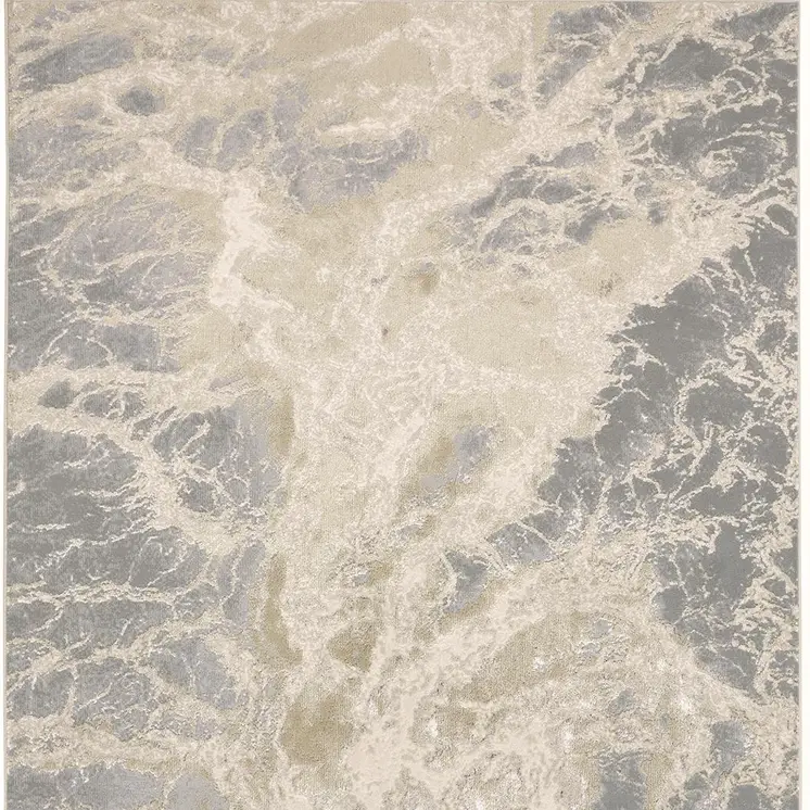 7' X 10' Ivory Silver And Gold Abstract Stain Resistant Area Rug