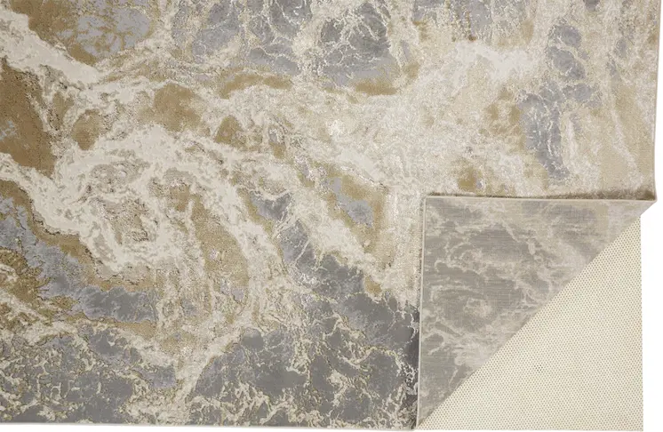 7' X 10' Ivory Silver And Gold Abstract Stain Resistant Area Rug