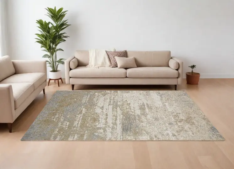 10' X 13' Ivory Gold And Gray Abstract Stain Resistant Area Rug