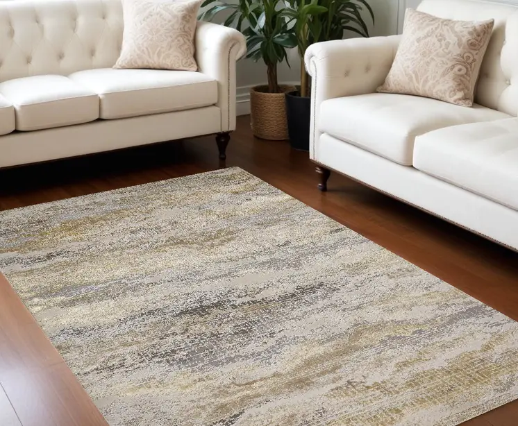 7' X 10' Gold Gray And Ivory Abstract Stain Resistant Area Rug