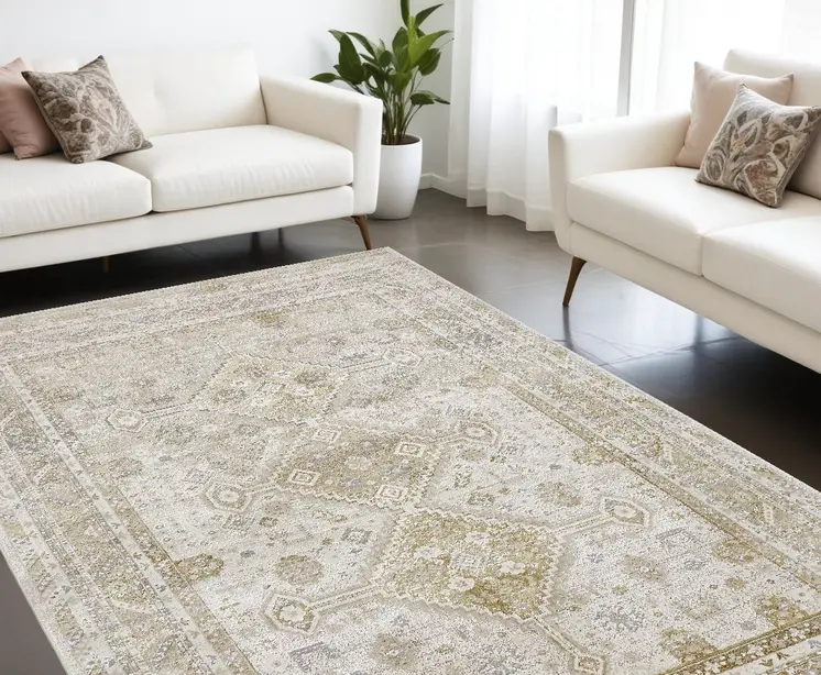 7' X 10' Gold And Ivory Floral Stain Resistant Area Rug