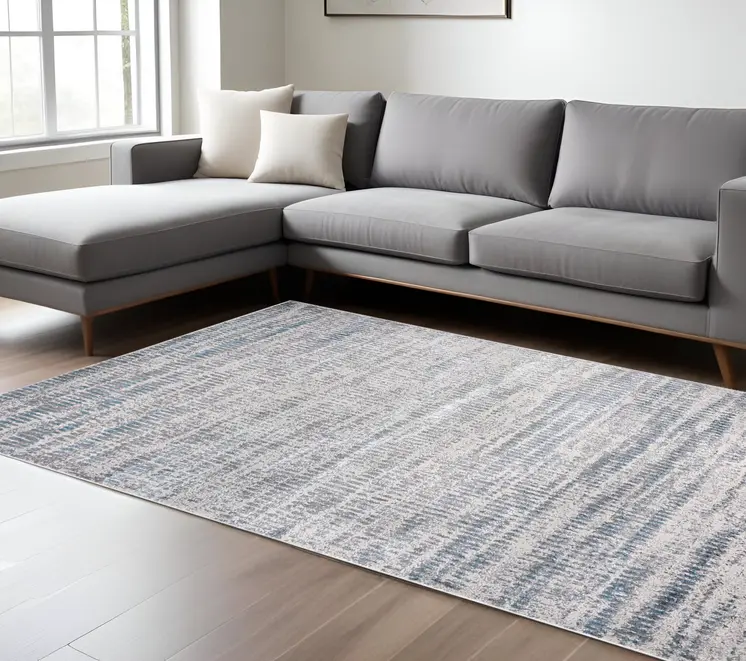 9' X 12' Blue Gray And Ivory Abstract Area Rug