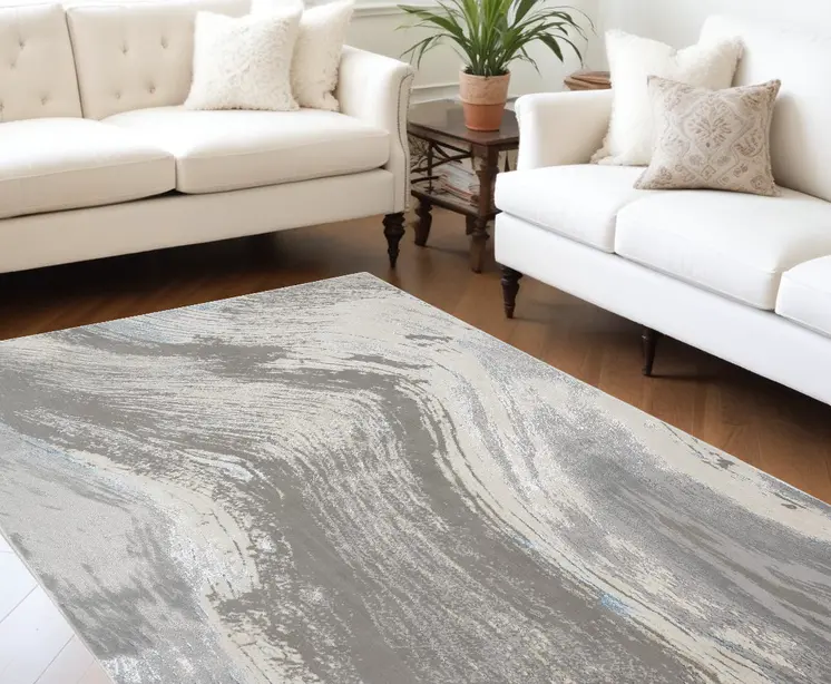 7' X 10' Gray Ivory And Blue Abstract Stain Resistant Area Rug