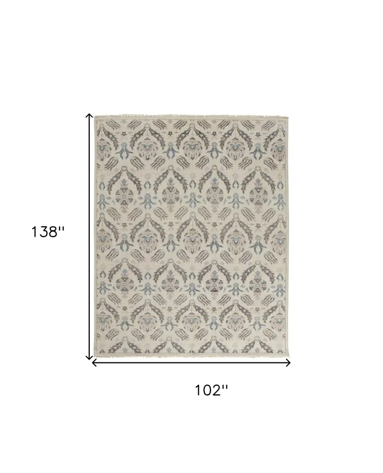 9' X 12' Ivory Gray And Blue Wool Floral Hand Knotted Stain Resistant Area Rug