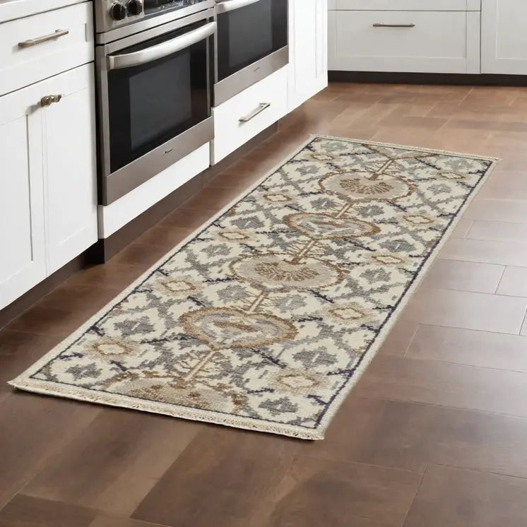 8' Gray and Ivory Wool Floral Hand Knotted Runner Rug With Fringe
