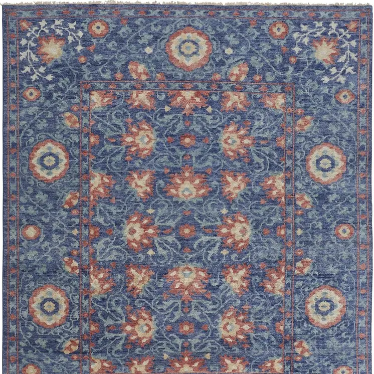 8' X 10' Blue And Red Wool Floral Hand Knotted Stain Resistant Area Rug