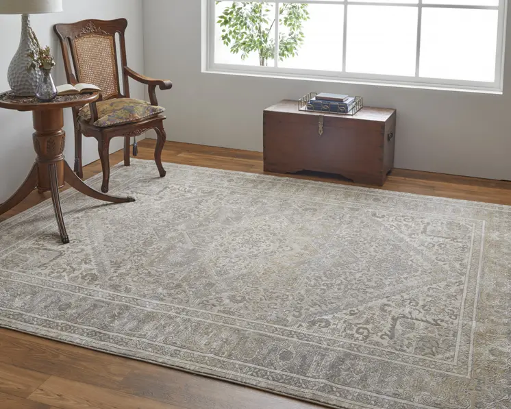 8' X 10' Tan Brown And Ivory Floral Power Loom Distressed Area Rug