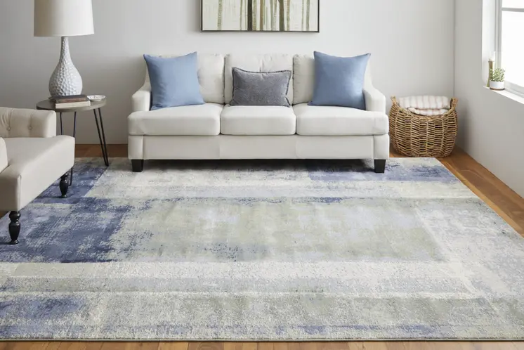 8' X 10' Blue and Ivory Abstract Power Loom Distressed Area Rug