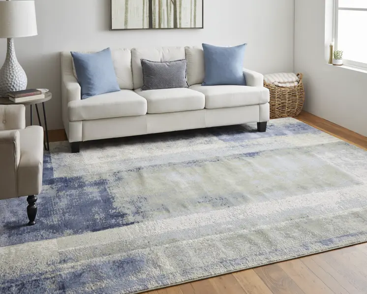 9' X 12' Blue Green And Ivory Abstract Power Loom Distressed Area Rug