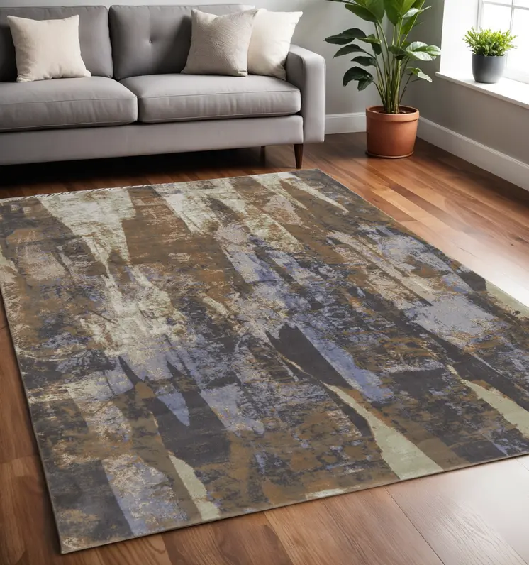 5' X 8' Blue and Ivory Abstract Power Loom Distressed Area Rug