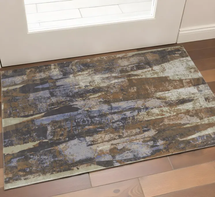 2' X 3' Brown Blue And Ivory Abstract Power Loom Distressed Area Rug