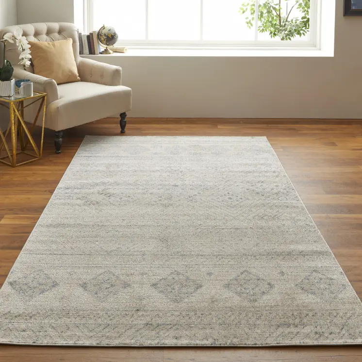 4' X 6' Ivory And Blue Geometric Power Loom Distressed Area Rug