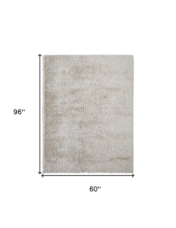 5' X 8' Ivory Shag Power Loom Stain Resistant Area Rug