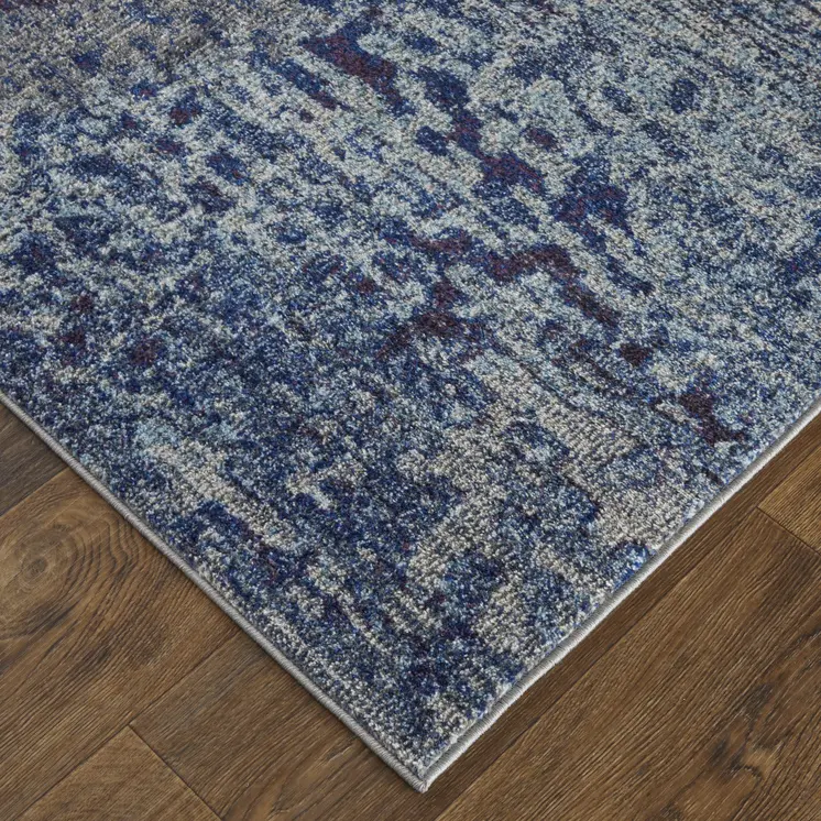 9' X 12' Blue Purple And Ivory Abstract Power Loom Stain Resistant Area Rug