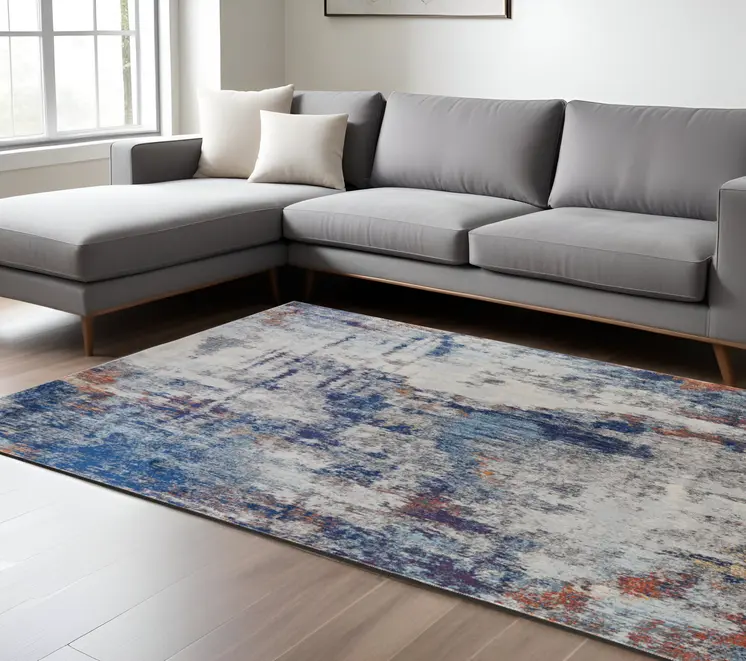 8' X 10' Ivory and Blue Abstract Power Loom Distressed Non Skid Area Rug