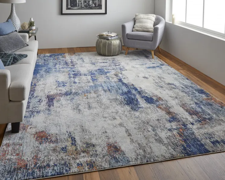 8' X 10' Ivory and Blue Abstract Power Loom Distressed Non Skid Area Rug