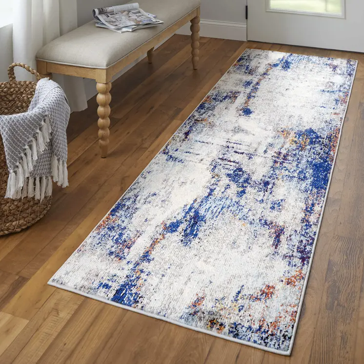 8' Ivory and Blue Abstract Power Loom Distressed Runner Rug