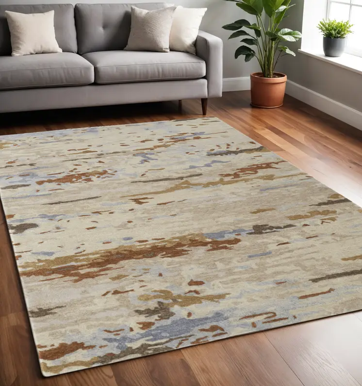 5' X 8' Ivory and Blue Wool Abstract Hand Tufted Area Rug