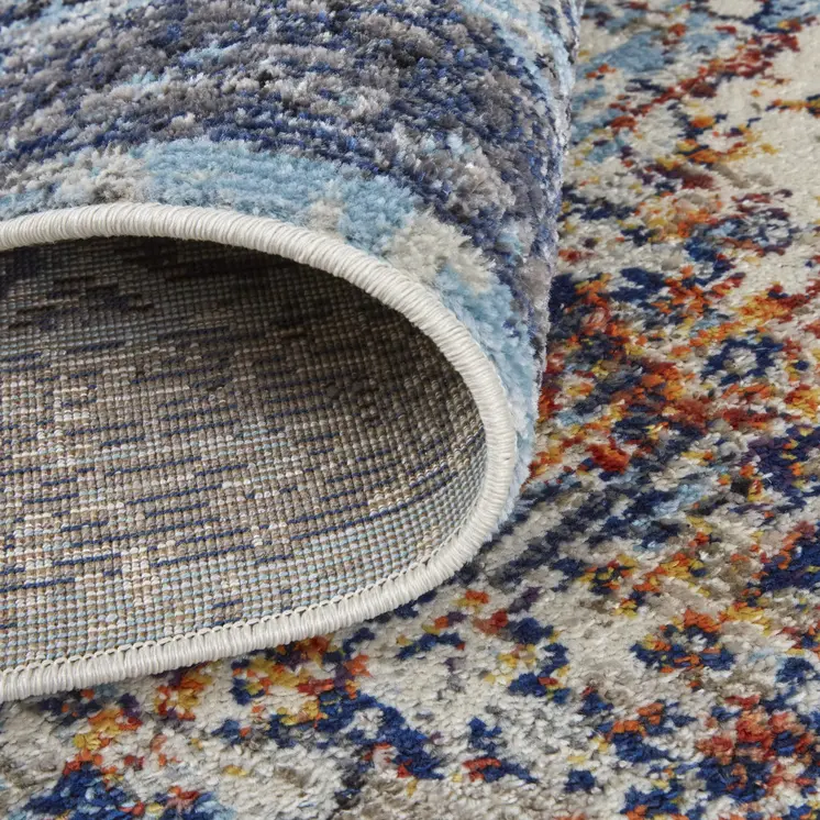 7' X 10' Blue and Ivory Floral Power Loom Distressed Non Skid Area Rug