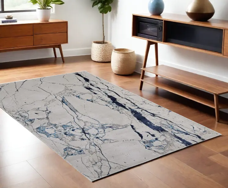 4' X 6' Ivory and Blue Marble Power Loom Distressed Area Rug
