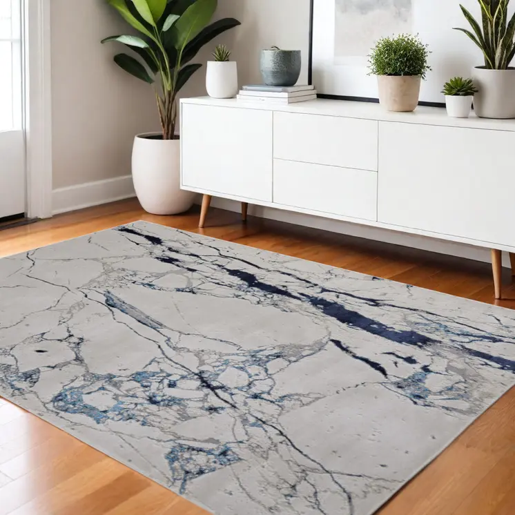 4' X 6' Ivory and Blue Marble Power Loom Distressed Area Rug