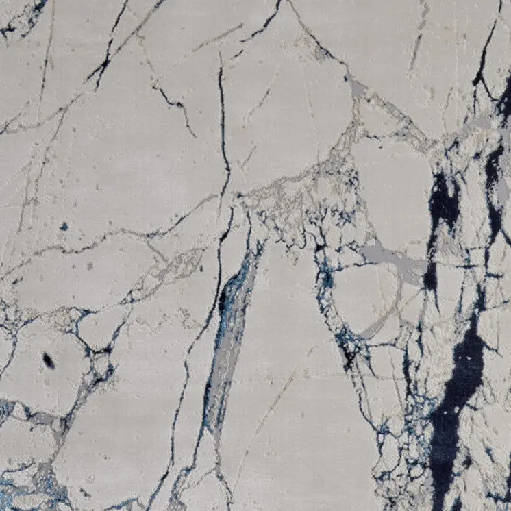 5' X 8' Ivory and Blue Marble Power Loom Distressed Area Rug