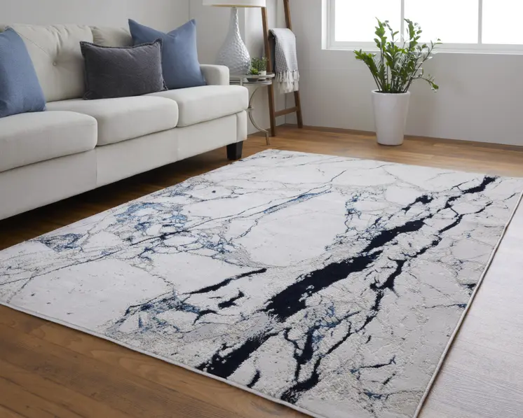 8' X 10' Ivory and Blue Marble Power Loom Distressed Area Rug