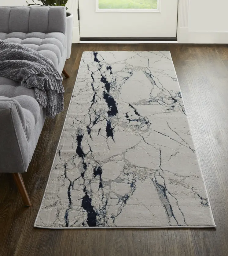 8' Ivory Blue And Black Abstract Power Loom Distressed Runner Rug