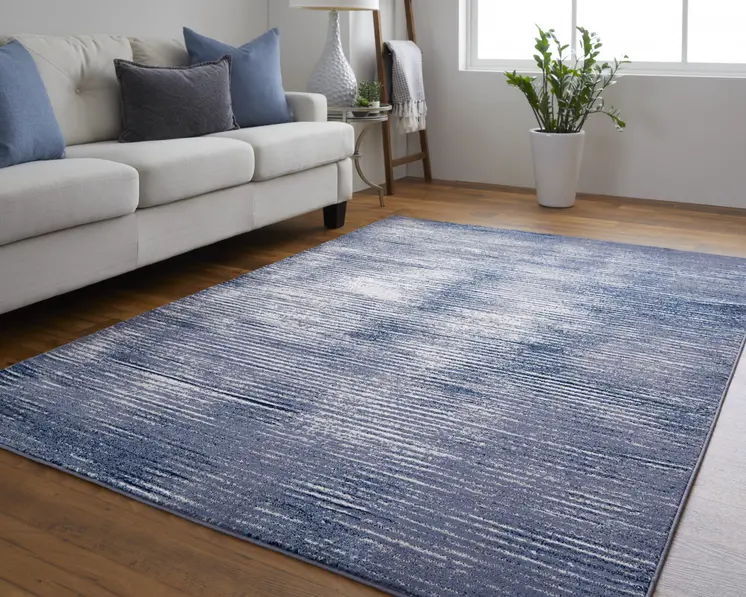 7' X 10' Blue and Ivory Striped Power Loom Distressed Non Skid Area Rug