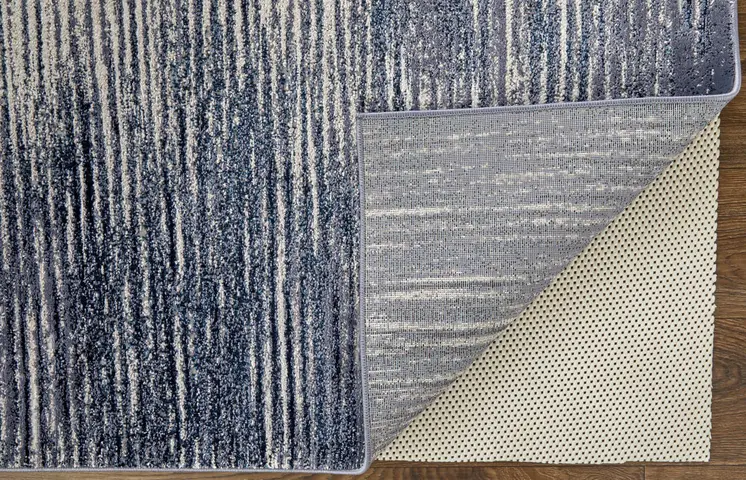 10' X 13' Blue Gray And Ivory Striped Power Loom Distressed Area Rug
