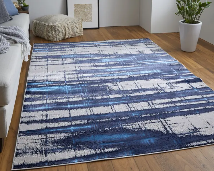 5' X 8' Ivory and Blue Abstract Power Loom Distressed Non Skid Area Rug