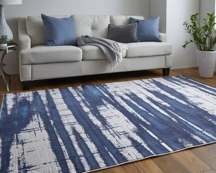 5' X 8' Ivory and Blue Abstract Power Loom Distressed Non Skid Area Rug