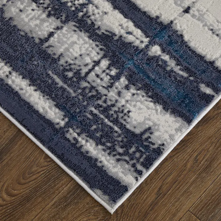 9' X 12' Ivory Blue And Gray Abstract Power Loom Distressed Area Rug