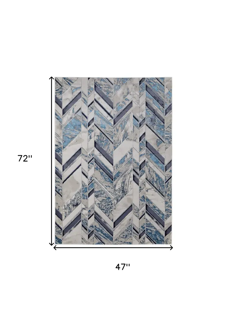 4' X 6' Ivory and Blue Chevron Power Loom Distressed Area Rug