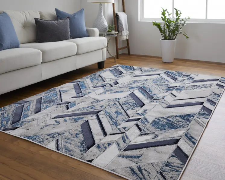 8' X 10' Ivory Blue And Gray Chevron Power Loom Distressed Area Rug