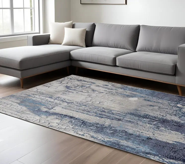 8' X 10' Ivory and Blue Abstract Power Loom Distressed Non Skid Area Rug