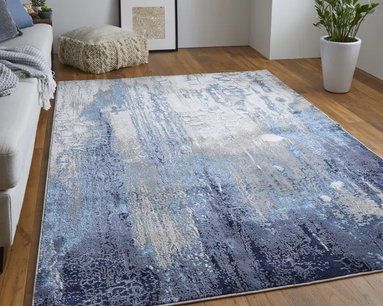 7' X 10' Ivory Blue And Black Abstract Power Loom Distressed Area Rug