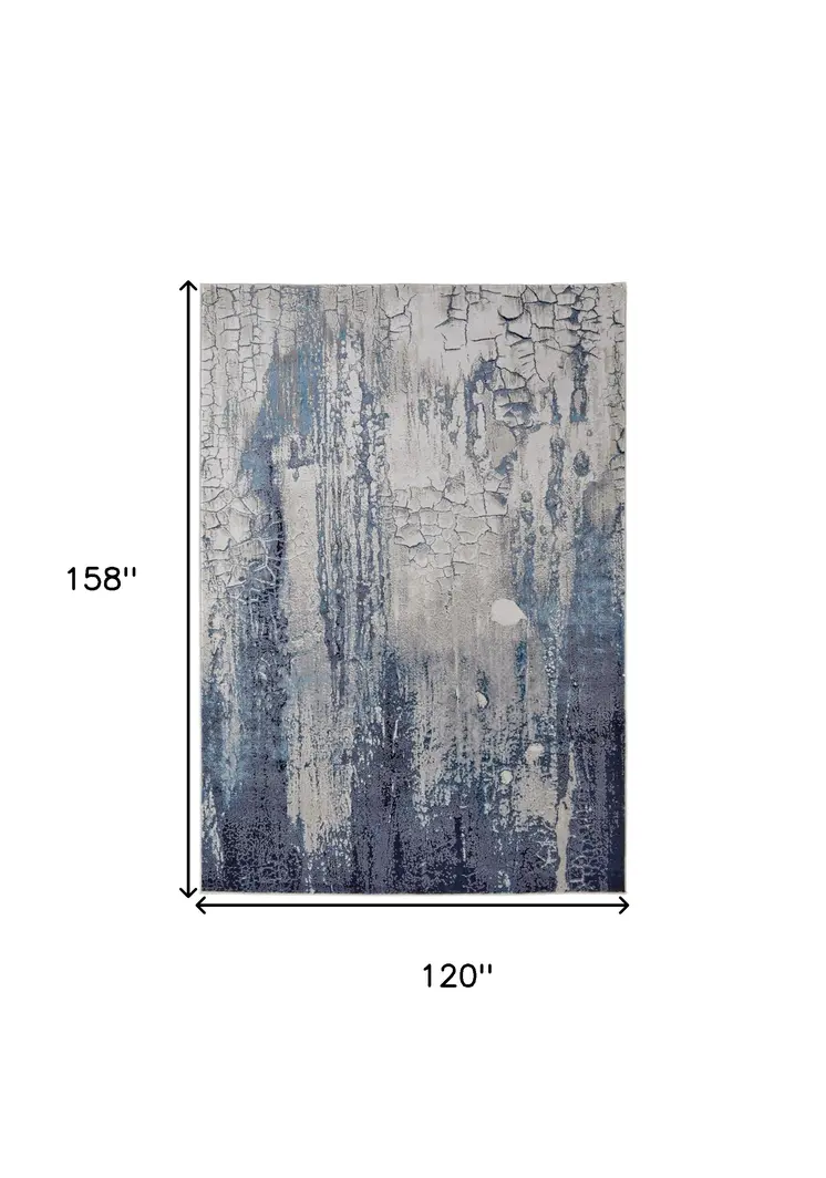 10' X 13' Ivory Blue And Black Abstract Power Loom Distressed Area Rug