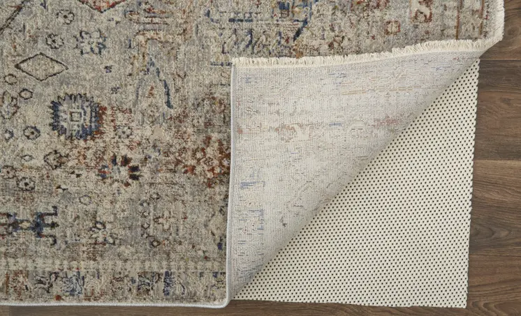 8' X 10' Tan and Red Floral Power Loom Distressed Non Skid Area Rug With Fringe