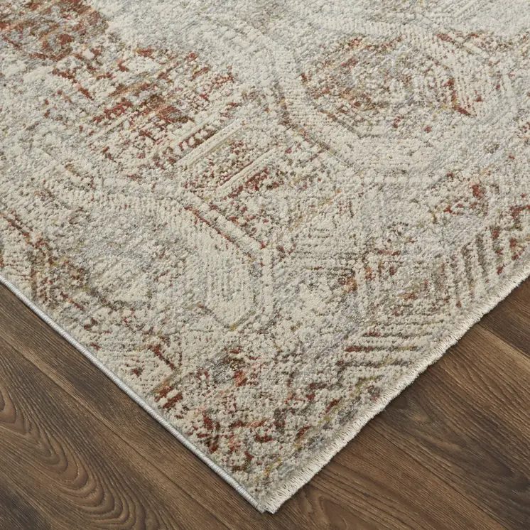 8' X 10' Tan and Ivory Floral Power Loom Distressed Non Skid Area Rug With Fringe
