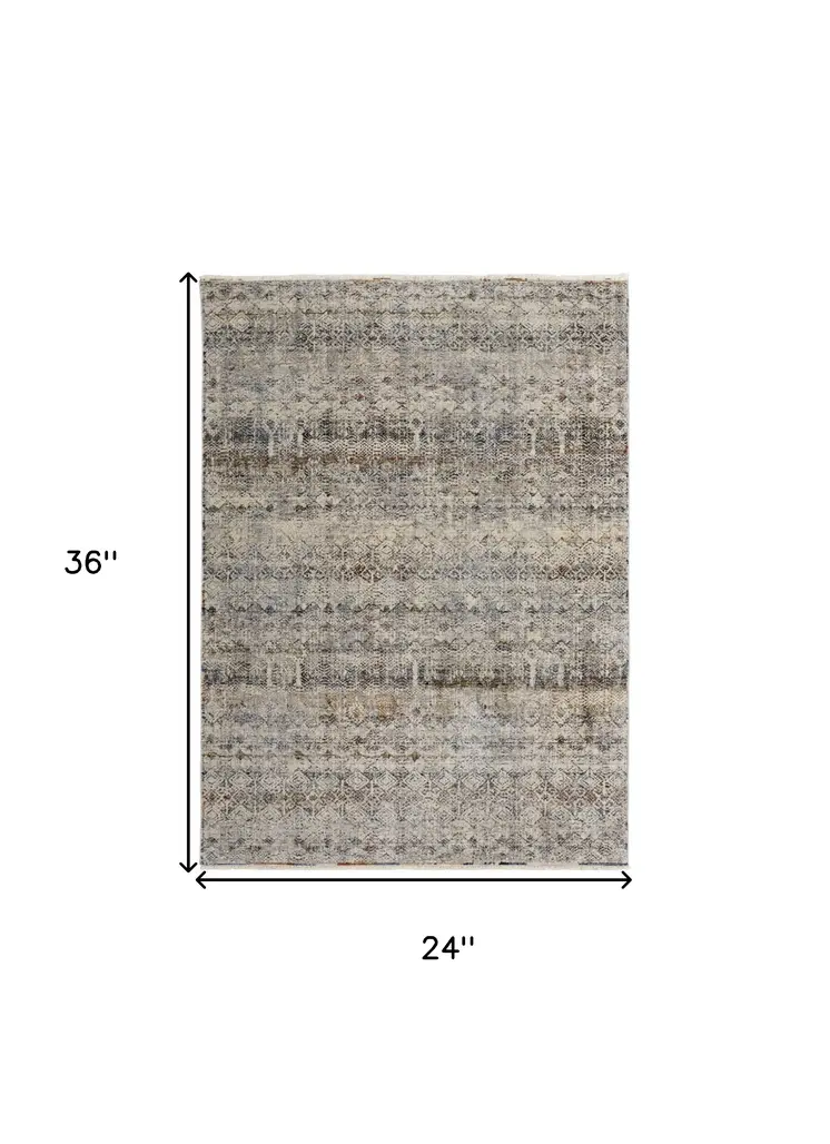 2' X 3' Tan Ivory And Blue Geometric Power Loom Distressed Area Rug With Fringe