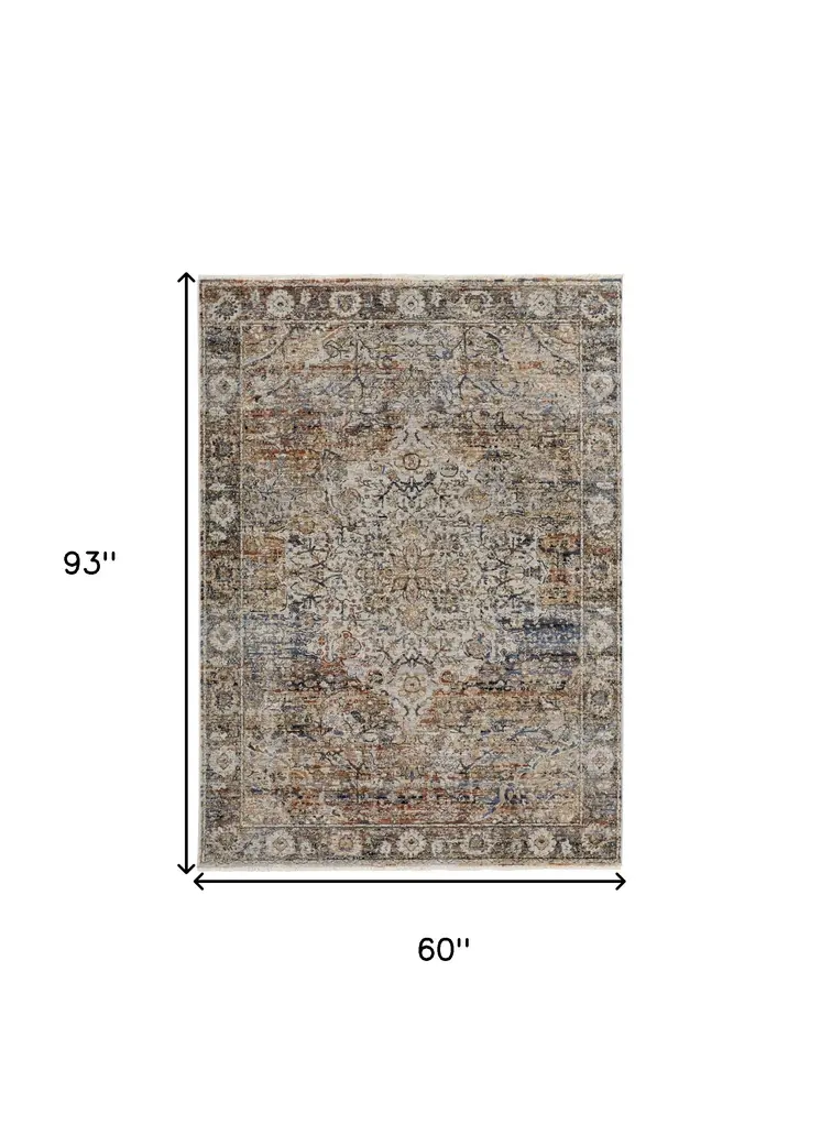 5' X 8' Tan and Blue Floral Power Loom Distressed Non Skid Area Rug With Fringe