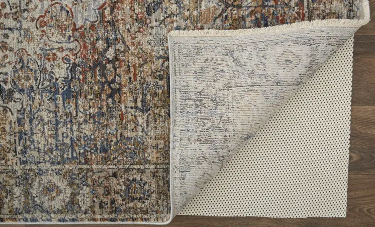 5' X 8' Tan and Blue Floral Power Loom Distressed Non Skid Area Rug With Fringe