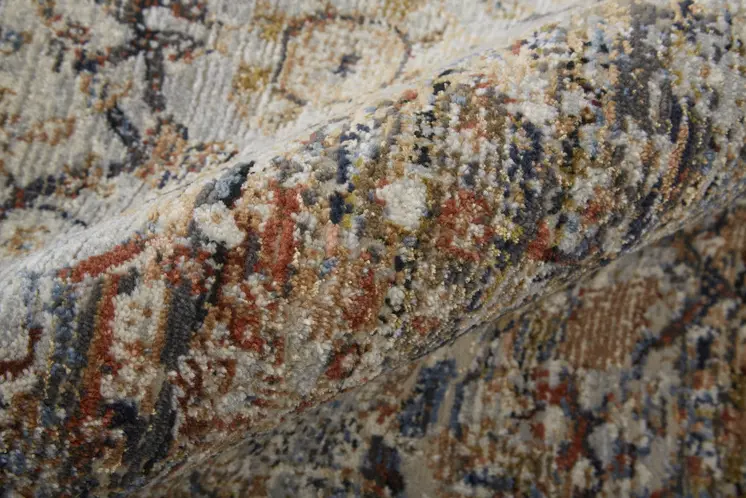 5' X 8' Tan and Blue Floral Power Loom Distressed Non Skid Area Rug With Fringe