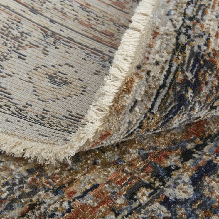 5' X 8' Tan and Blue Floral Power Loom Distressed Non Skid Area Rug With Fringe