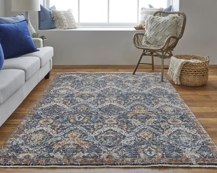 12' X 15' Blue Orange And Ivory Floral Power Loom Area Rug With Fringe