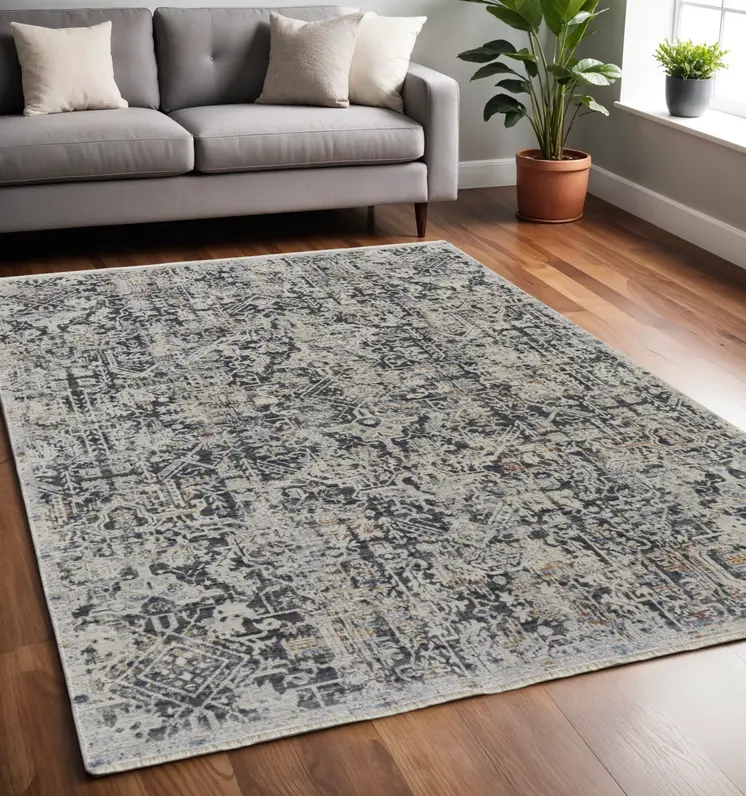 5' X 8' Gray and Ivory Abstract Power Loom Distressed Non Skid Area Rug With Fringe