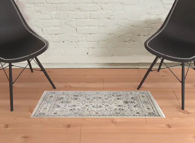 2' X 3' Tan Ivory And Blue Floral Stain Resistant Area Rug