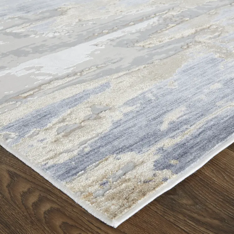 5' X 8' Tan Orange And Ivory Abstract Power Loom Distressed Area Rug