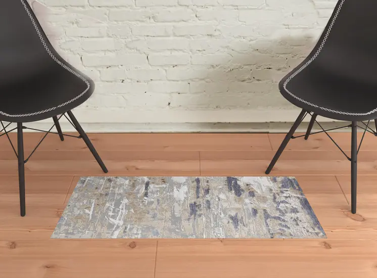 2' X 3' Tan Orange And Ivory Abstract Power Loom Distressed Area Rug